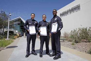 LAPD Officers Brian Harris, left, Hector Nunez, center, and James Woods were among those honored with the 10851 VC award at the LAPD Topanga Community Police Station in Canoga Park on Wednesday, Aug. 18, 2010. The 10851 VC award is given to officers who arrest at least six suspects in one year who are caught driving stolen vehicles. 10851 VC is the California Vehicle Code section that suspects are booked under when driving a stolen vehicle. Vehicle thefts are one of the most reported crimes in the Topanga Area.