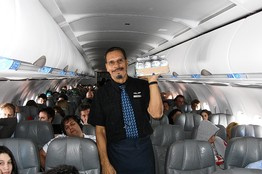 JetBlue flight attendant, Leonard Spivey, uses lessons from his days as a fire fighter.