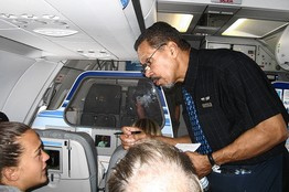 Mr. Spivey working as a JetBlue flight attendant.