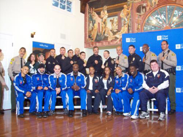 Los Angeles Police Chief Charlie Beck (rear, center), flanked to his right by New York Police Lt. Dave Siev and Los Angeles County Sheriff Lee Baca, pose for a picture with LAPD, NYPD and LASD deputies and officers at City of Hope in Duarte on Wednesday, Nov. 17, 2010. The officers and deputies will be boxing in the "Fight for Life" tournament on Thursday, Nov. 18, 2010, in Montebello, to raise money for City of Hope.