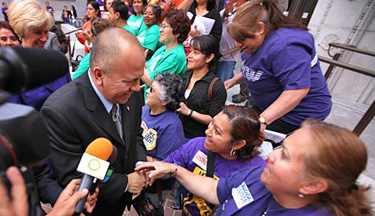 Councilman Ed Reyes meets with supporters after the council voted to ban most city travel to Arizona and future contracts with companies in that state in response to Arizona's crackdown on illegal immigration.