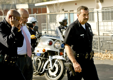 Photo: Los Angeles Police Chief Charlie Beck heads to a news conference at Hale Middle School on Thursday.