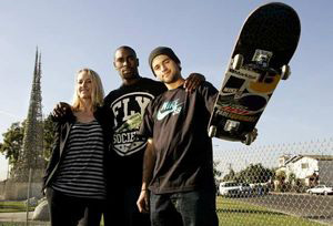 Pro skaters Terry Kennedy (center) and Paul Rodriguez (right) and their manager, Circe Wallace, are key backers of a skate park near the Watts Towers.