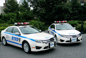 Eco-friendly Ford Fusion hybrids are joining Nissan Altimas to replace sturdy, but fuel-consuming NYPD Chevy Impalas.