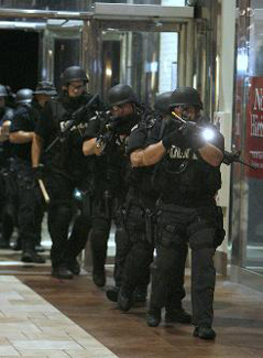  By Terrance Armstard, The (Monroe, La.) News-Star, via AP Members of law enforcement agencies conduct training exercises in Pecanland Mall in Monroe, La., on Aug. 26 