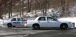 The Westchester County (N.Y.) Police Department uses a ghost car, a cruiser that has no roof lights and whose markings can be seen only at close range. Their "low-profile" police vehicle, in the background, does not have the traditional light bar on top.