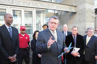 City Attorney Carmen Trutanich discussed the injunction in April, outside the Midnight Mission.