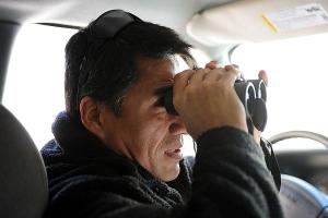 Sgt. Ron Alberca, head of LAPD's H2O unit, monitors a target outside the San Fernando Courthouse. Repeat DUI offenders are believed to be the cause of 8 percent of all fatal alcohol-related crashes in California. (Andy Holzman / Staff Photographer)