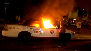 Taxi on fire after Lakers Championship win.