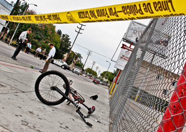 The scene in the Exposition Park area where a man was shot Tuesday morning.