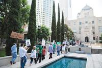 Protesters oppose cuts to library funding outside the Central Library last year