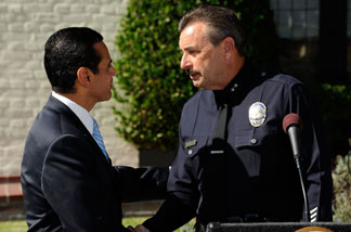 Los Angeles Mayor Antonio Villaraigosa (L) congratulates Los Angeles Police Department Deputy Chief Charles Beck after he was announced as the mayor's selection to be the new Chief of Police at a news conference at the Getty House, the official residence of the mayor, on November 3, 2009 in Los Angeles, California.