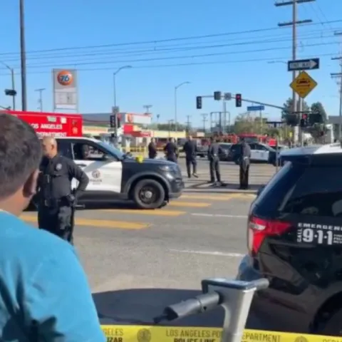 Gunfire erupts in busy L.A. intersection; 1 killed, 1 injured