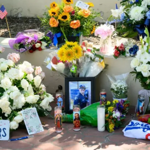 Baldwin Park officer ran into hail of bullets to aid other officers, officials say. Suspect charged