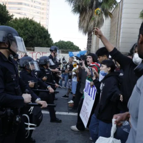 Man who allegedly shot paintballs at officer during protest is charged